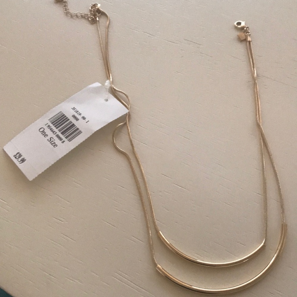Gold colored double necklace